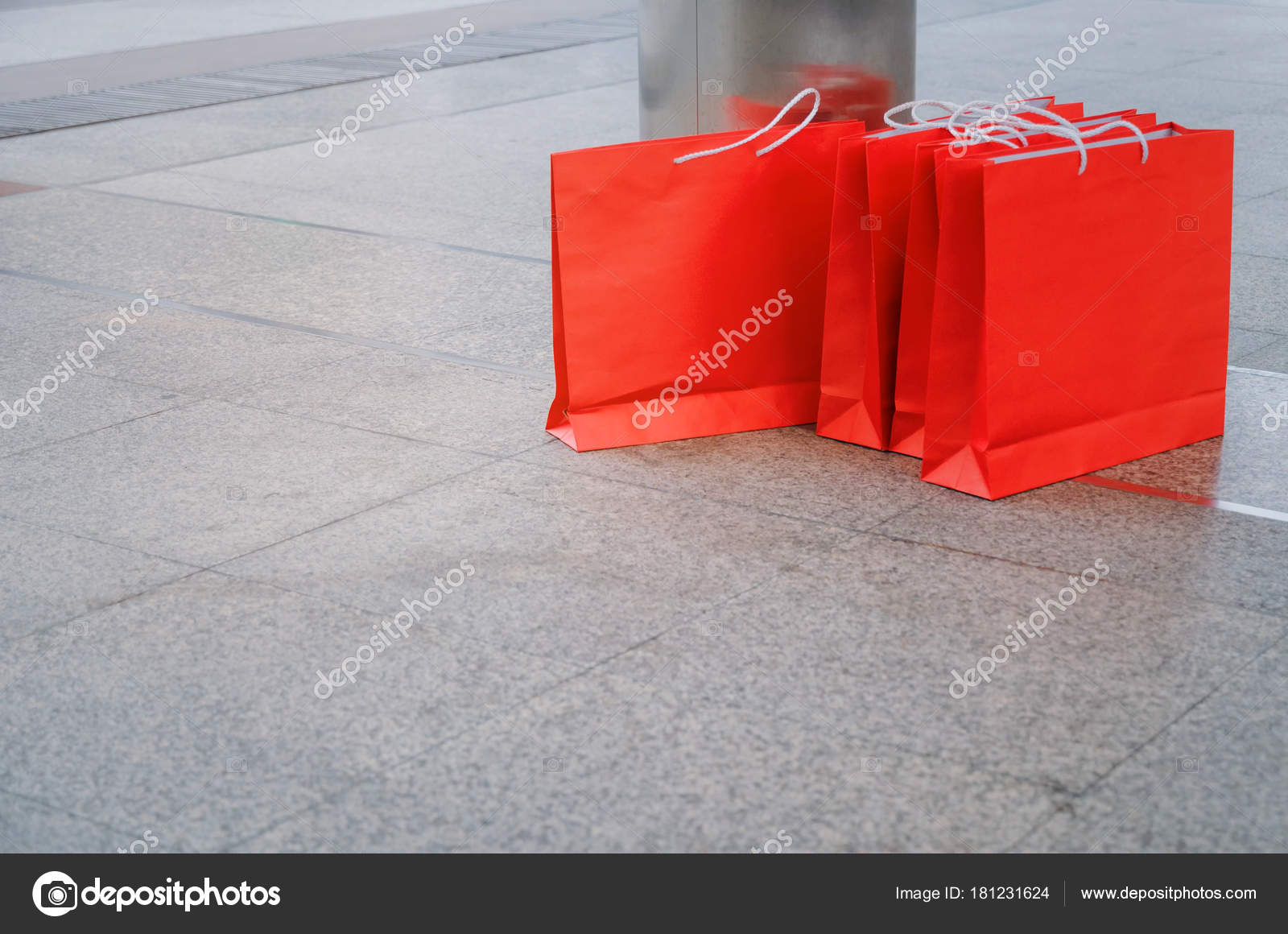 Many Colorful Red Paper Shopping Bags Floor Modern City Background