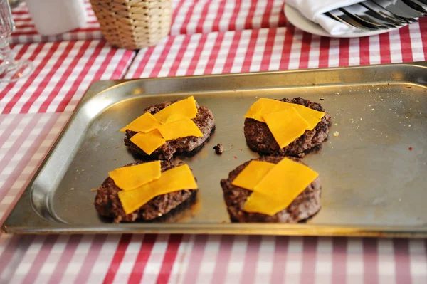 Beef or pork meat barbecue burgers with cheddar cheese — Stock Photo, Image