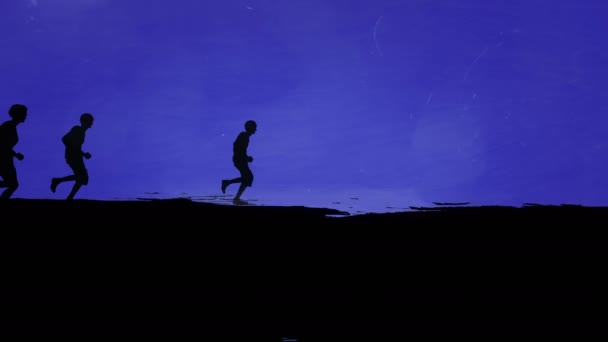 Σιλουέτες των νέων τρέξιμο, έννοια animation — Αρχείο Βίντεο