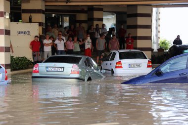 European city flooded during a heavy rain clipart