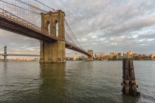 Sunset view of Manhattan Bridge and Brooklyn Bridge, New York, NYC, USA