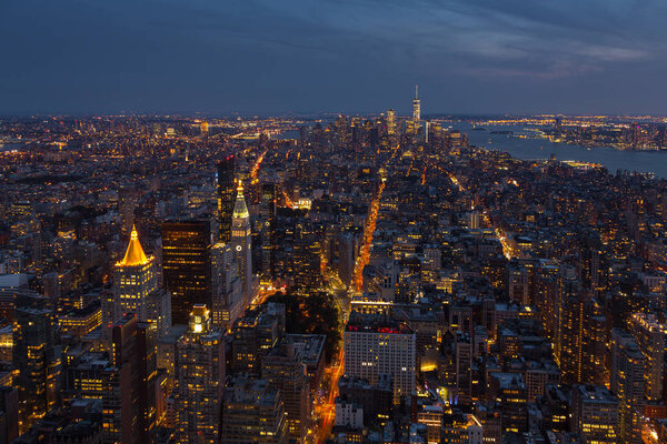 Aerial view of Manhattan at night, New York City in United States, America.
