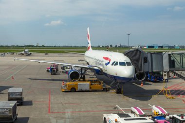 Aircraft line British Airways Airbus A320 ready for departure, London, UK.