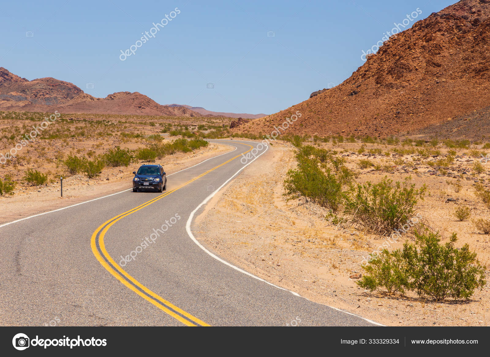 Car on the Jubilee Pass Road to Death Valley National Park, California