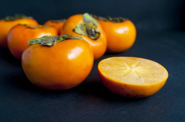 Ripe orange persimmon fruit clipart
