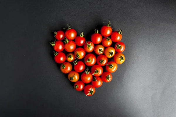 Red cherry rajčata dobré pro srdce Stock Fotografie