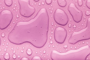 Bir renk arka plan üzerinde Su damlacıkları. Pembe. Tonda