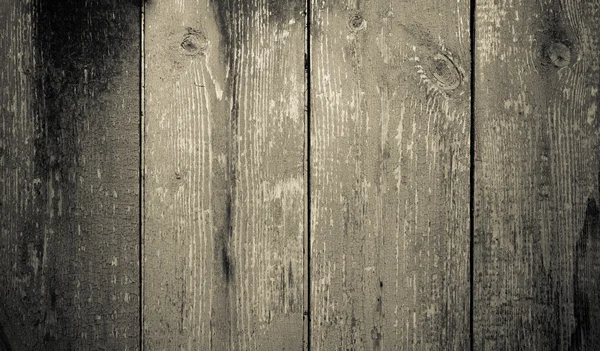 Tábuas de madeira velhas com tinta de descascamento como fundo. Tonificado — Fotografia de Stock