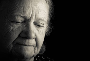 Portrait of elderly woman. Sad. Toned clipart