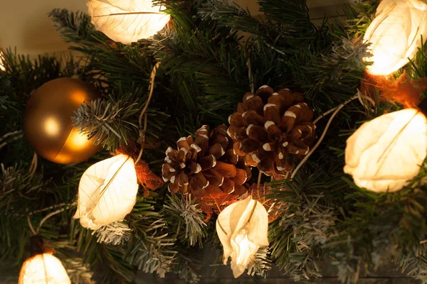 Decorative lights and fir tree branch - christmas decoration. Ne — Stock Photo, Image