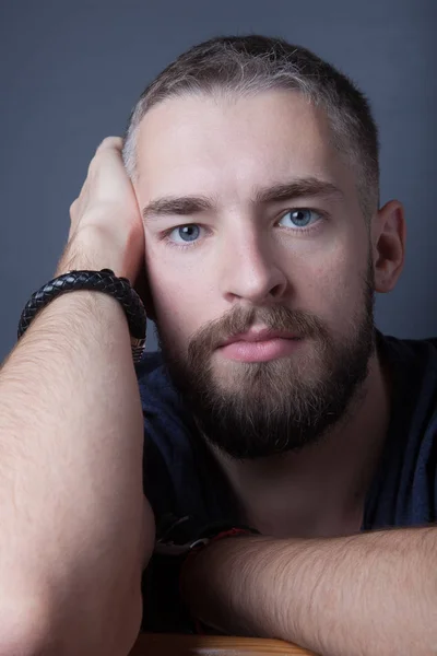 Portrait of a young man with a beard — Stock Photo, Image