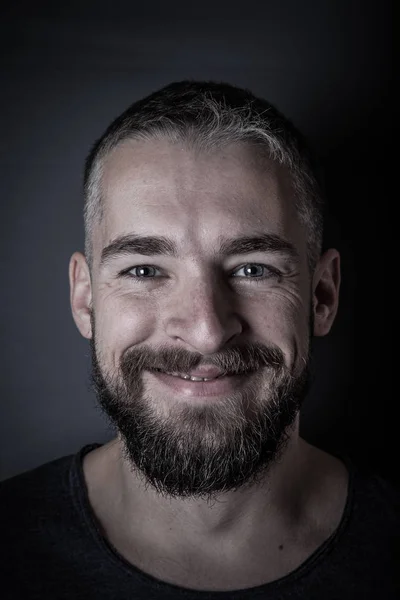 Portrait of a young man with a beard. Toned — Stock Photo, Image