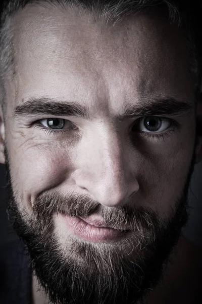 Portrait of a young man with a beard. Toned — Stock Photo, Image