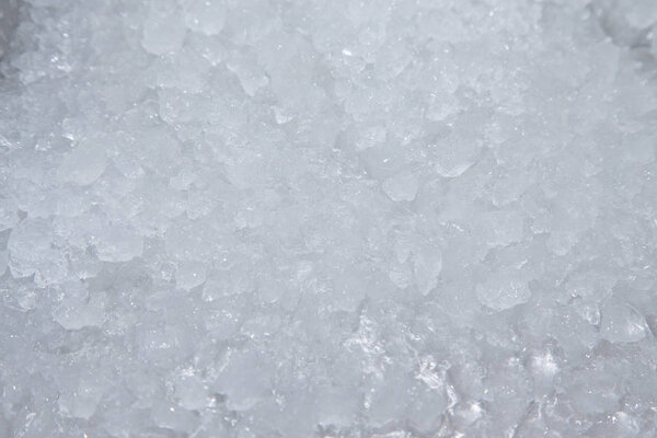 Surface of pile of ice in fish restaurant. Selective focus. Shal
