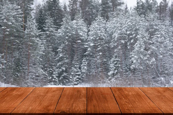 Snowy winter in the forest. Background. View from dark wooden ga — Stock Photo, Image