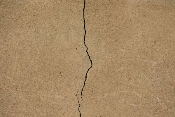 Light plastered wall with crack for background. Close up detail. — Stock Photo, Image