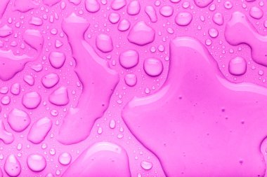 Bir renk arka plan üzerinde Su damlacıkları. Pembe. Tonda