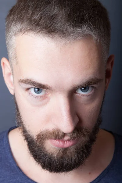 Portrait of a young man with a beard — Stock Photo, Image