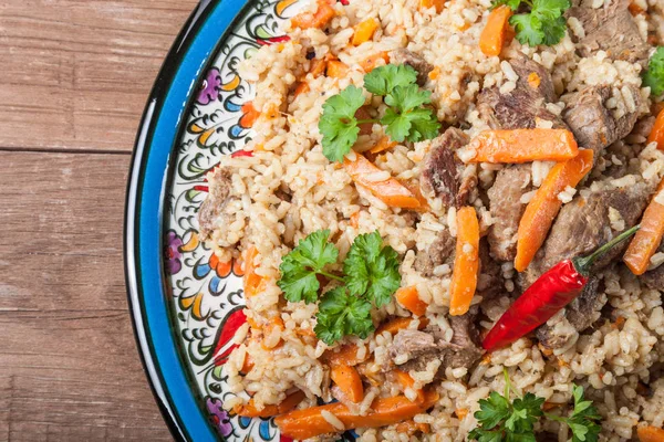 Hot delicious pilaf with dried fruits — Stock Photo, Image