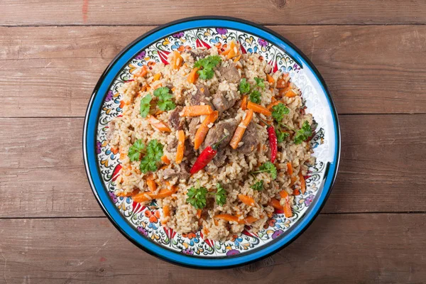 Hot delicious pilaf with dried fruits — Stock Photo, Image