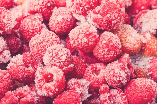 Many frozen berries for natural background. Selective focus. Ton