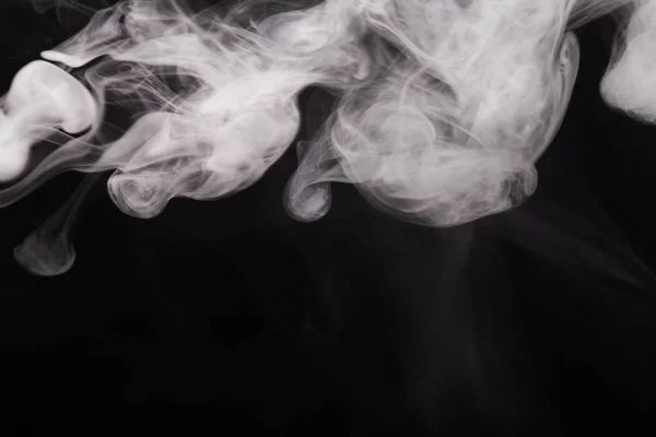 Cloud of smoke on black background. Selective focus — Stock Photo, Image