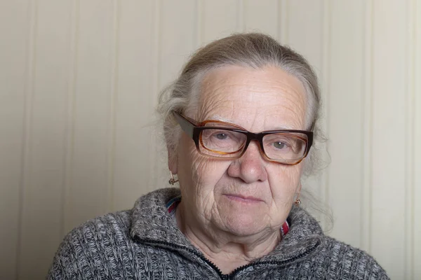 Portrait of elderly woman with glasses — Stock Photo, Image