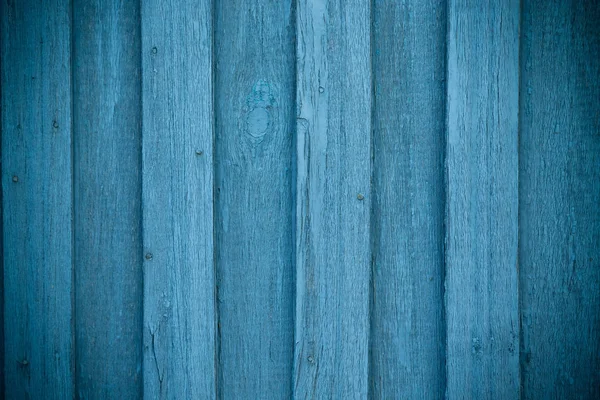 Alte Holzbohlen mit abblätternder Farbe als Hintergrund. gemildert — Stockfoto
