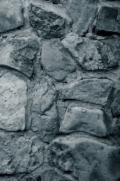 Стена из натурального камня с цементом. Toned — стоковое фото
