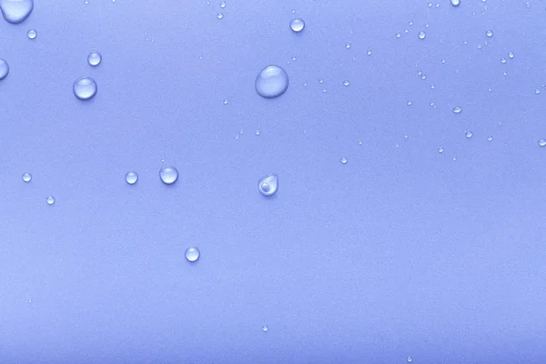 Druppels water op een gekleurde achtergrond. Gray. Toned — Stockfoto
