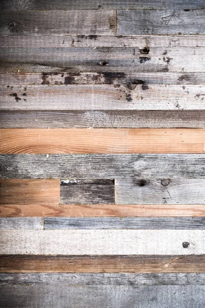 Wooden background from the ends of old boards. Toned — Stock Photo, Image