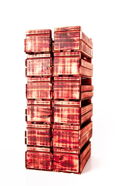 Caixas de madeira queimadas artesanalmente em um fundo leve. Tonificado — Fotografia de Stock