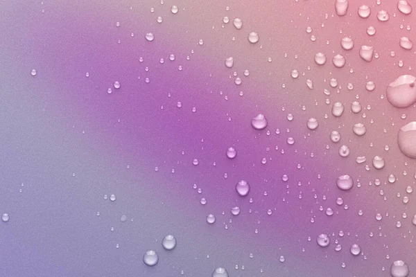 Drops of water on a color background — Stock Photo, Image
