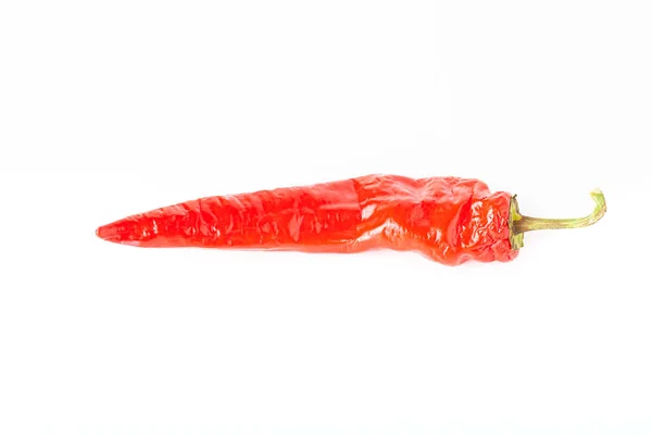 Bright red hot chili pepper isolated on white background — ストック写真