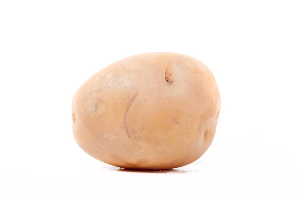 Молодой картофель на светлом фоне — стоковое фото