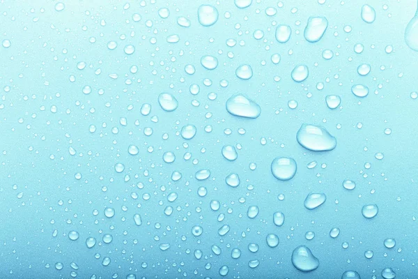 Drops of water on a color background. Selective focus. Blue. Ton — Stock Photo, Image