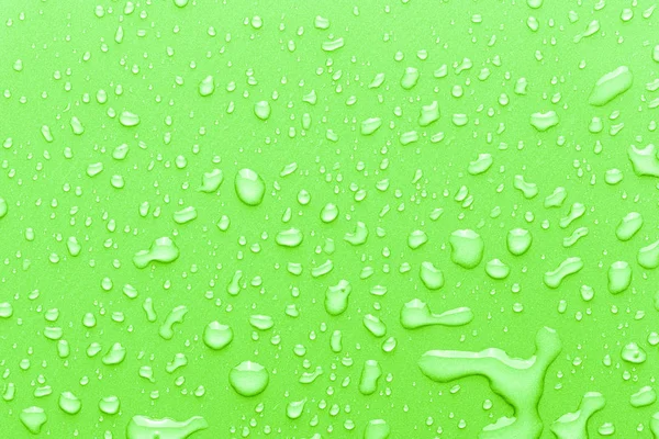 Drops of water on a color background. — Stock Photo, Image