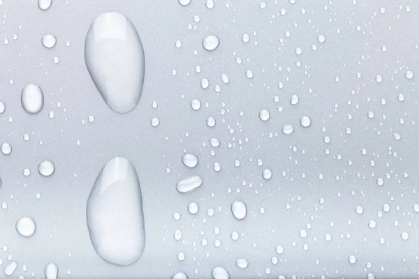 Drops of water on a color background. Gray — Stock Photo, Image