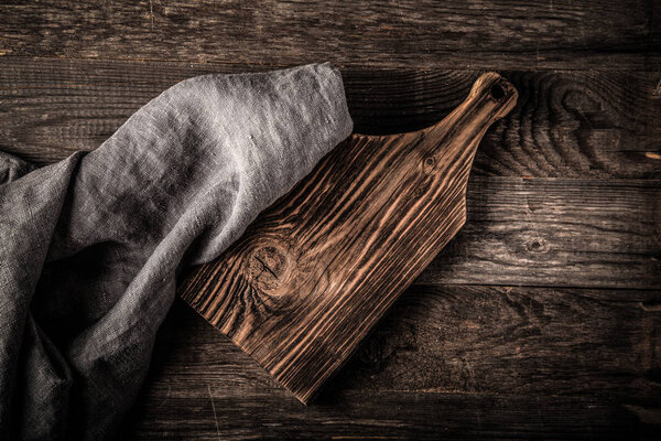 Rustic composition with a rough linen napkin. Toned