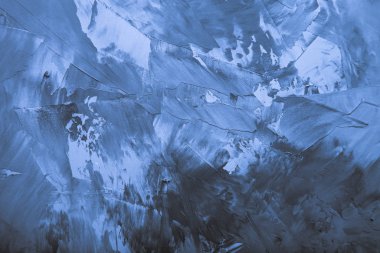 Çeşitli keyfi lekelerle kaplanmış arkaplan.