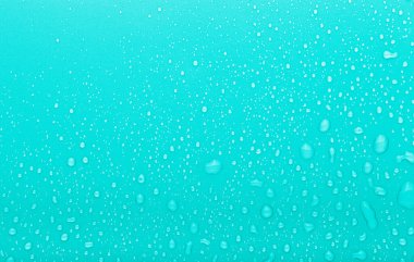 Renkli arka planda bir damla su. Mavi. Ayarlanmış.