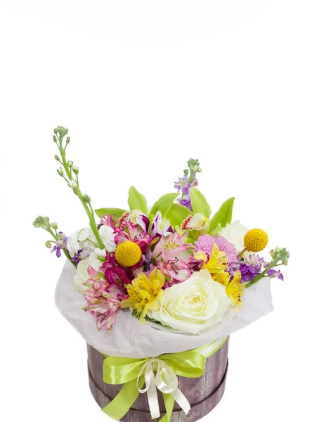 Bright flower bouquet in paper box isolated on white — Stock Photo, Image