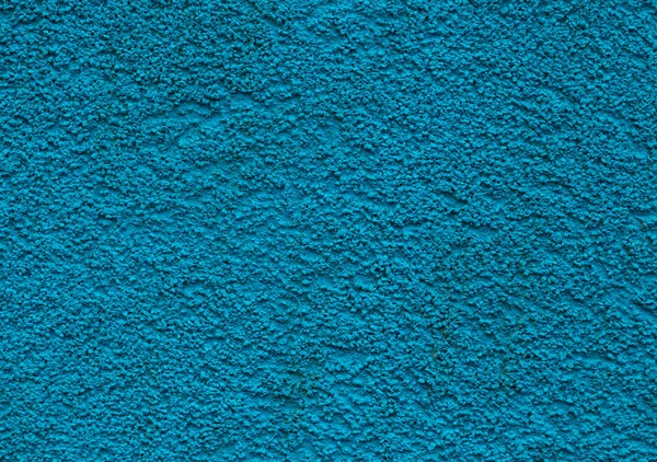 Pared texturizada azul. Pared en blanco texturizado de color azul . — Foto de Stock