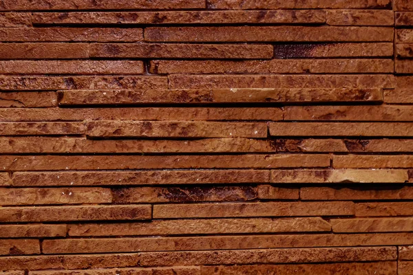 Texture brun foncé d'un mur de pierre . — Photo