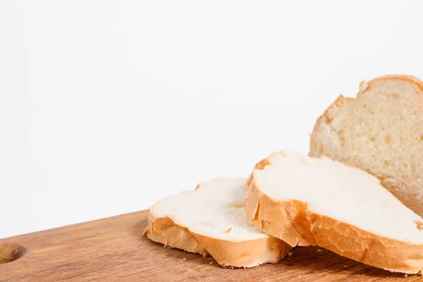 Vista Laterale Fette Pane Bianco Tavolo Cucina Uno Sfondo Bianco — Foto Stock