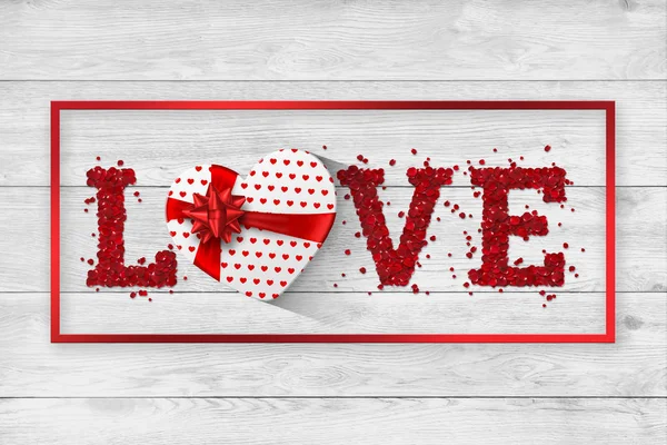 Festive web banner for Valentine\'s Day. Top view of a composition with the word love from rose petals and a realistic gift in the form of a heart on a white background. Greeting card, flyer.