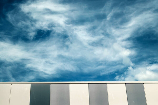 Shelf overlooking the blue beautiful sky with clouds copy space
