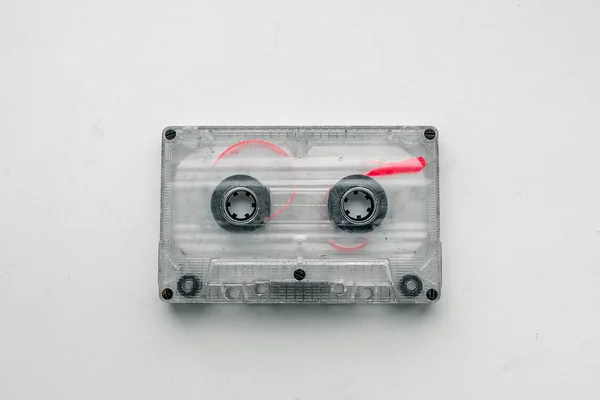 Transparent old audio cassette isolated on white, with clipping path.