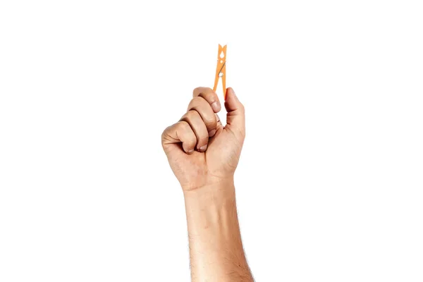 Man Hand Holds Clothespin White Background Isolate — стоковое фото