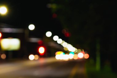 Noel ışıkları siyah bir arka plan bokeh bulanık. Işık bokeh soyut. Yeni yıl 2018, tatil, tatil kavramı.